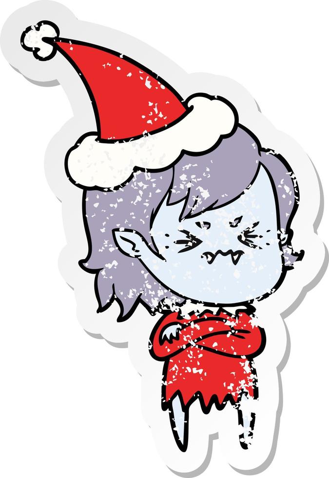 annoyed distressed sticker cartoon of a vampire girl wearing santa hat vector