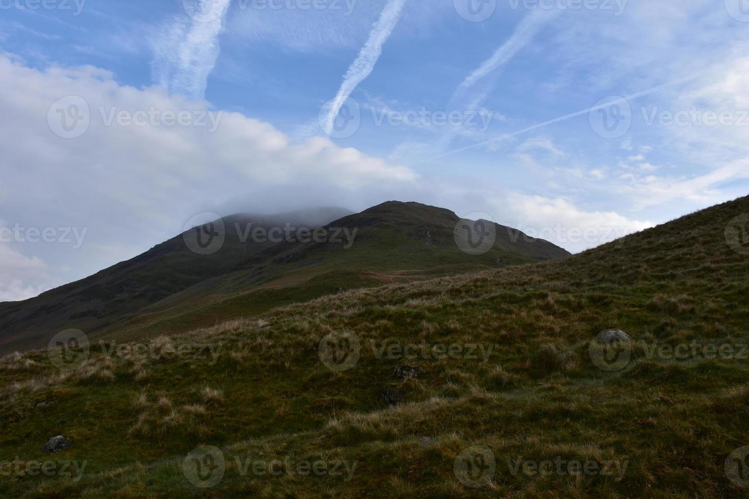 Blue Skies with Clouds Over Kidsty Pike photo