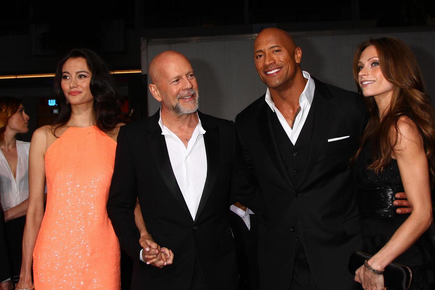 LOS ANGELES, MAR 28 - Emma Heming, Bruce Willis, Dwayne Johnson, Lauren Hashian arrives at the G.I. Joe - Retaliation  LA Premiere at the Chinese Theater on March 28, 2013 in Los Angeles, CA photo