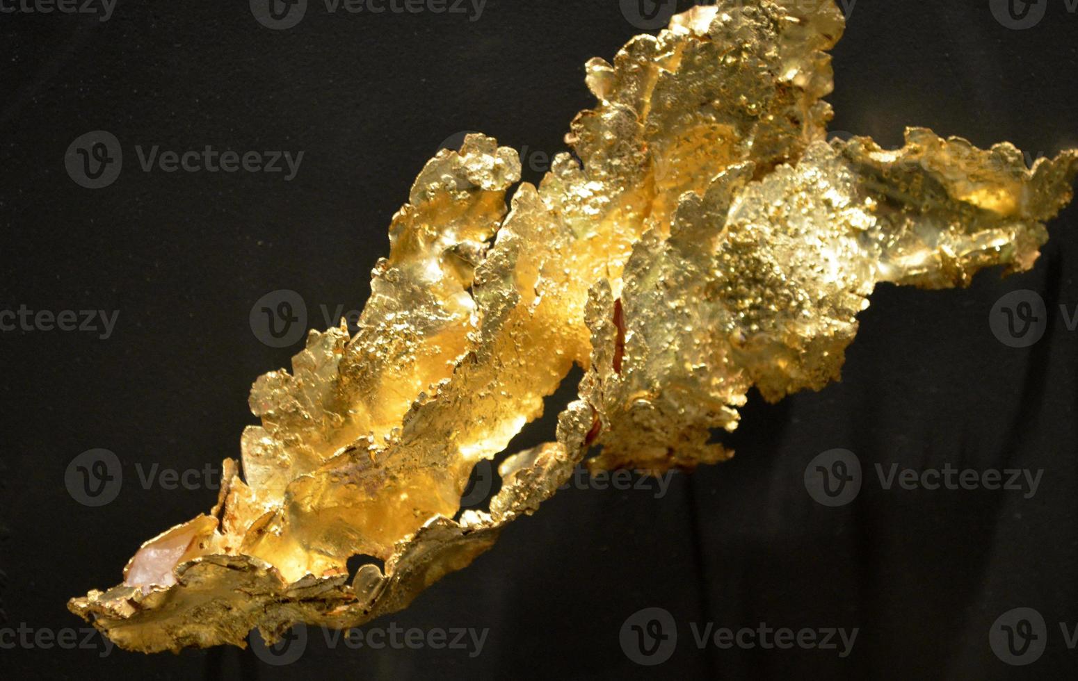 Light Shining Off a Large Gold Flake photo