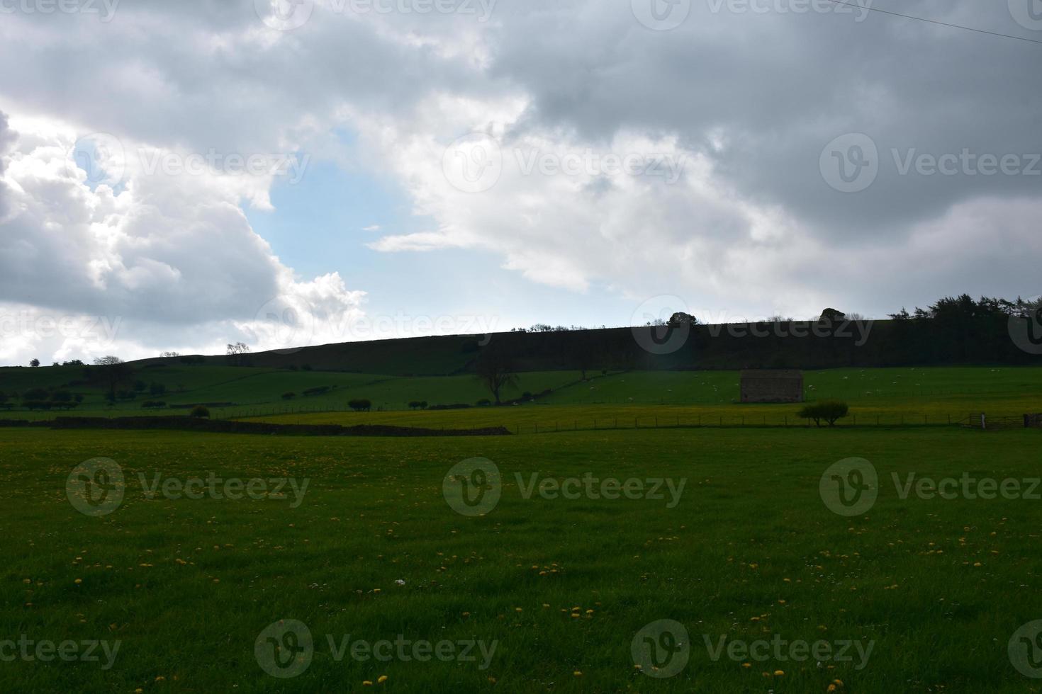 Dark Clouds Over Fields in the Spring photo