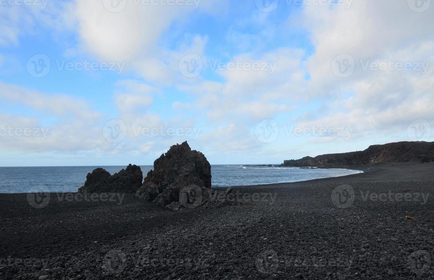 Lovely Landscape with a Black Sand Beach in Iceland photo