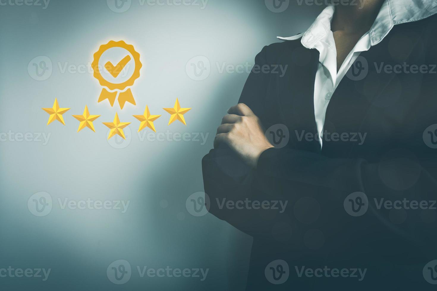 Businesswoman showing the symbol of top service 5 star quality assurance, excellent warranty, world standard, ISO certification, development and improve the quality of the organization concept. photo