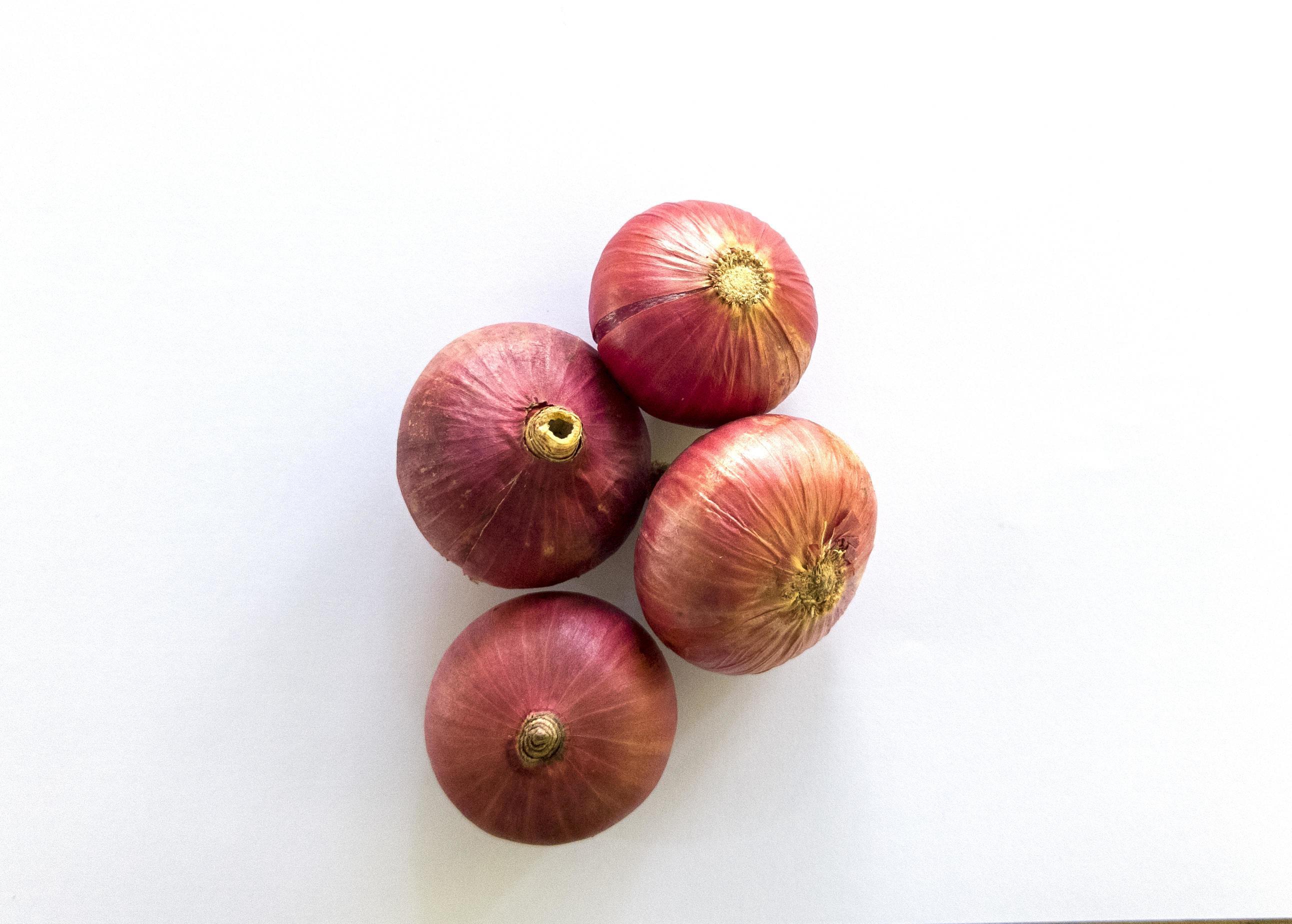 Group Thai red onion or Shallots. Fresh purple shallots on white  background. Selected focus. Concept of spices in healthy cooking 9629790  Stock Photo at Vecteezy