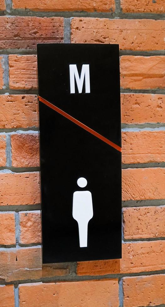 Restroom sign on a toilet door. Toilet sign Restroom Concept black tone. Toilet icons set. Men signs for restroom. photo