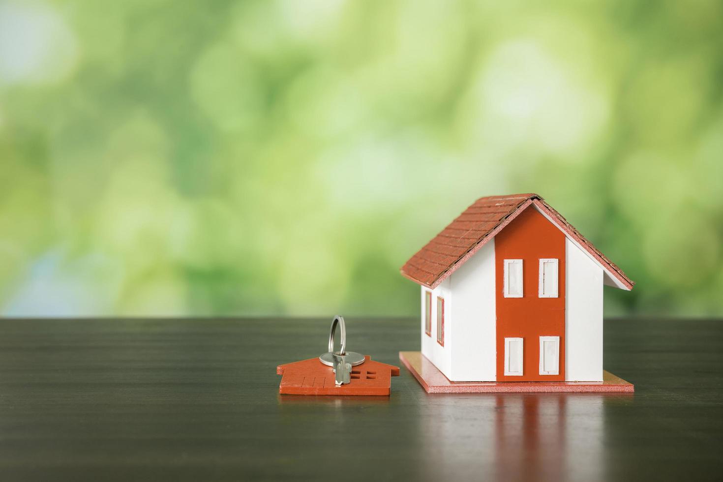 house and keys with bokeh background photo