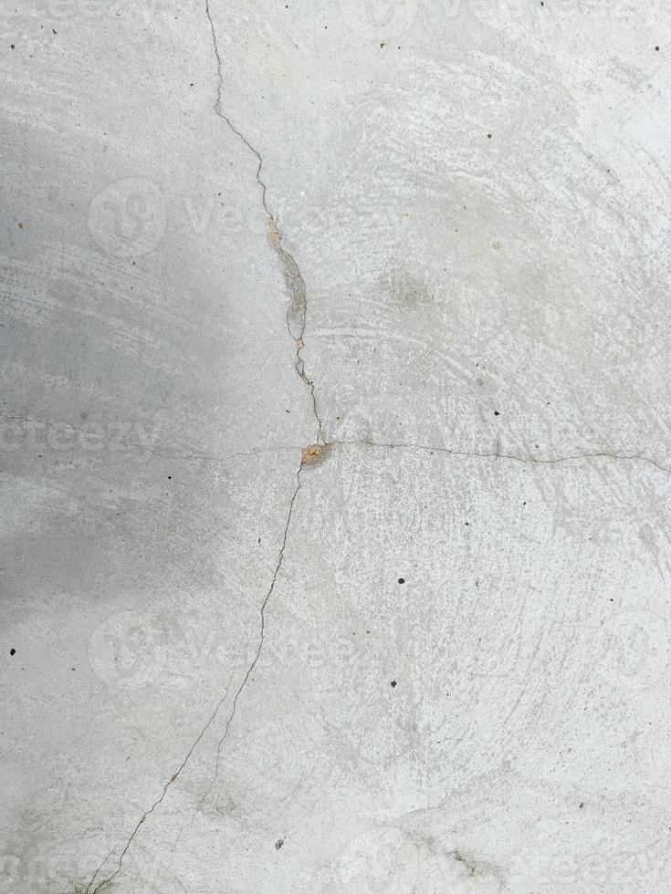 Concrete cement wall with crack in industrial building, great for your design and texture background photo