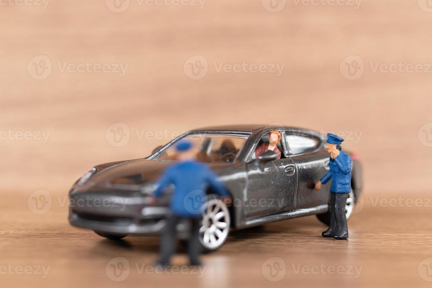 Miniature Ladies in her car requesting police assistance photo