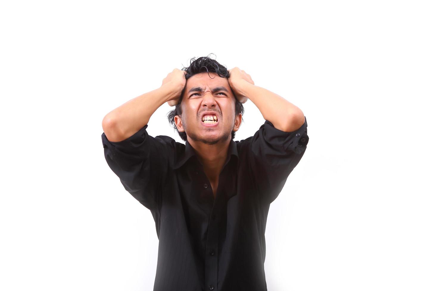 Young man furious over white background photo