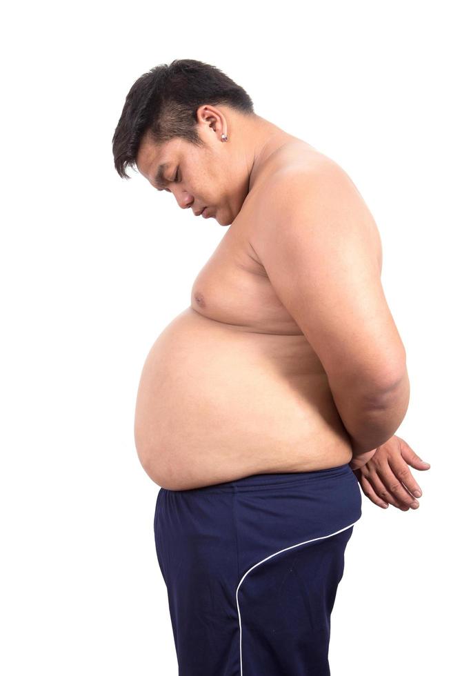 hombre gordo con una gran barriga. dieta foto
