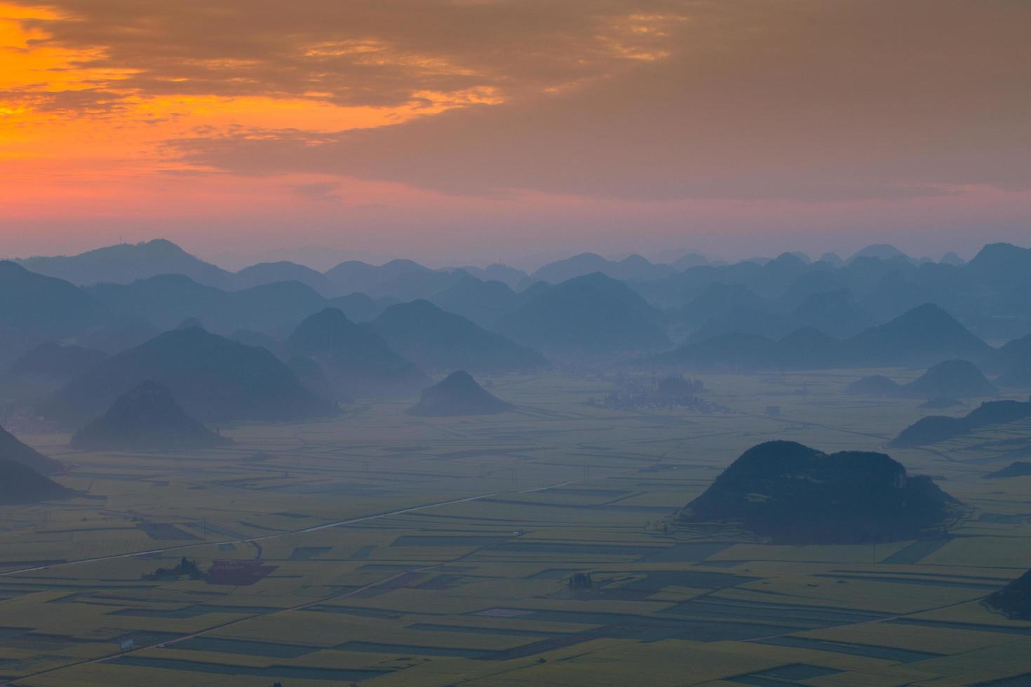 Yellow rapeseed flower field in Luoping, China photo