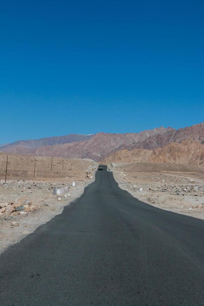 High altitude road in mountains photo