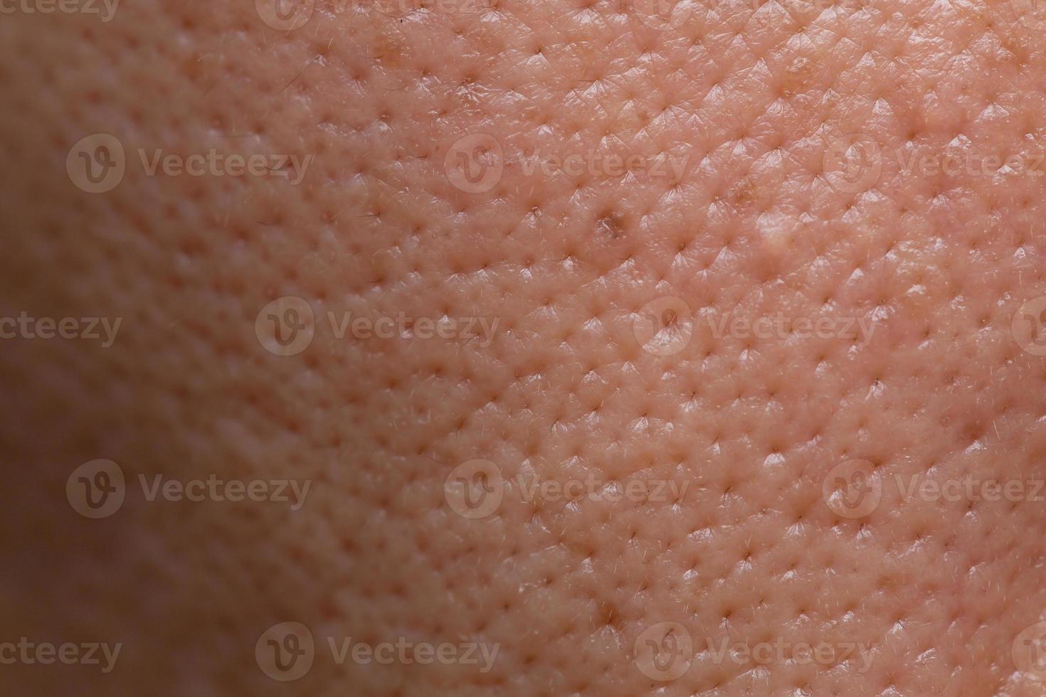 closeup male skin pores with face hire macro detail photo