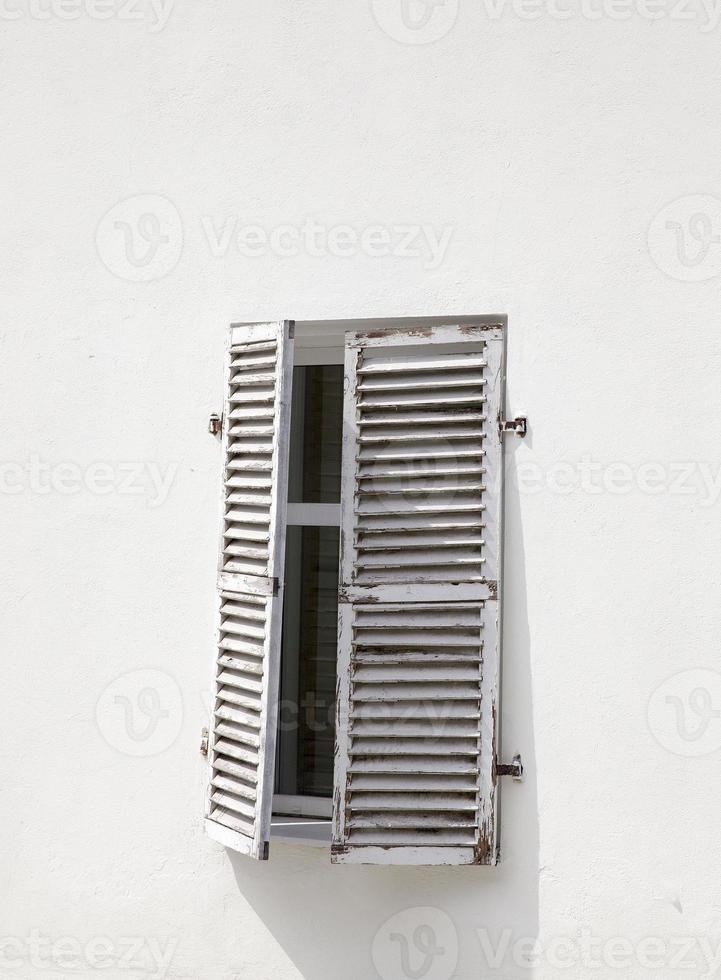 wooden shutters on the window photo