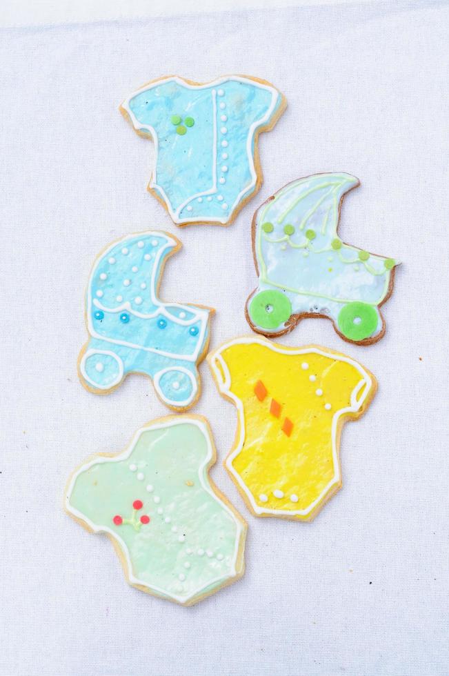 cookies in the shape of the pram and clothes photo