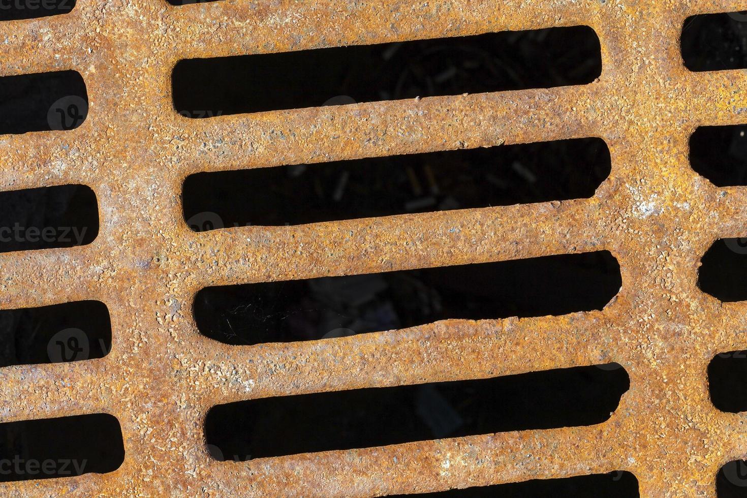 sewer grating, close up photo