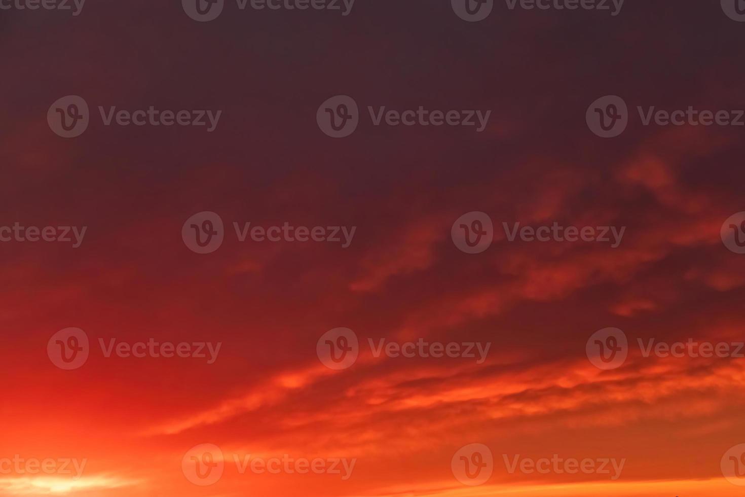 Beautiful clouds at sunset. Dramatic sky in sun. Natural background. photo