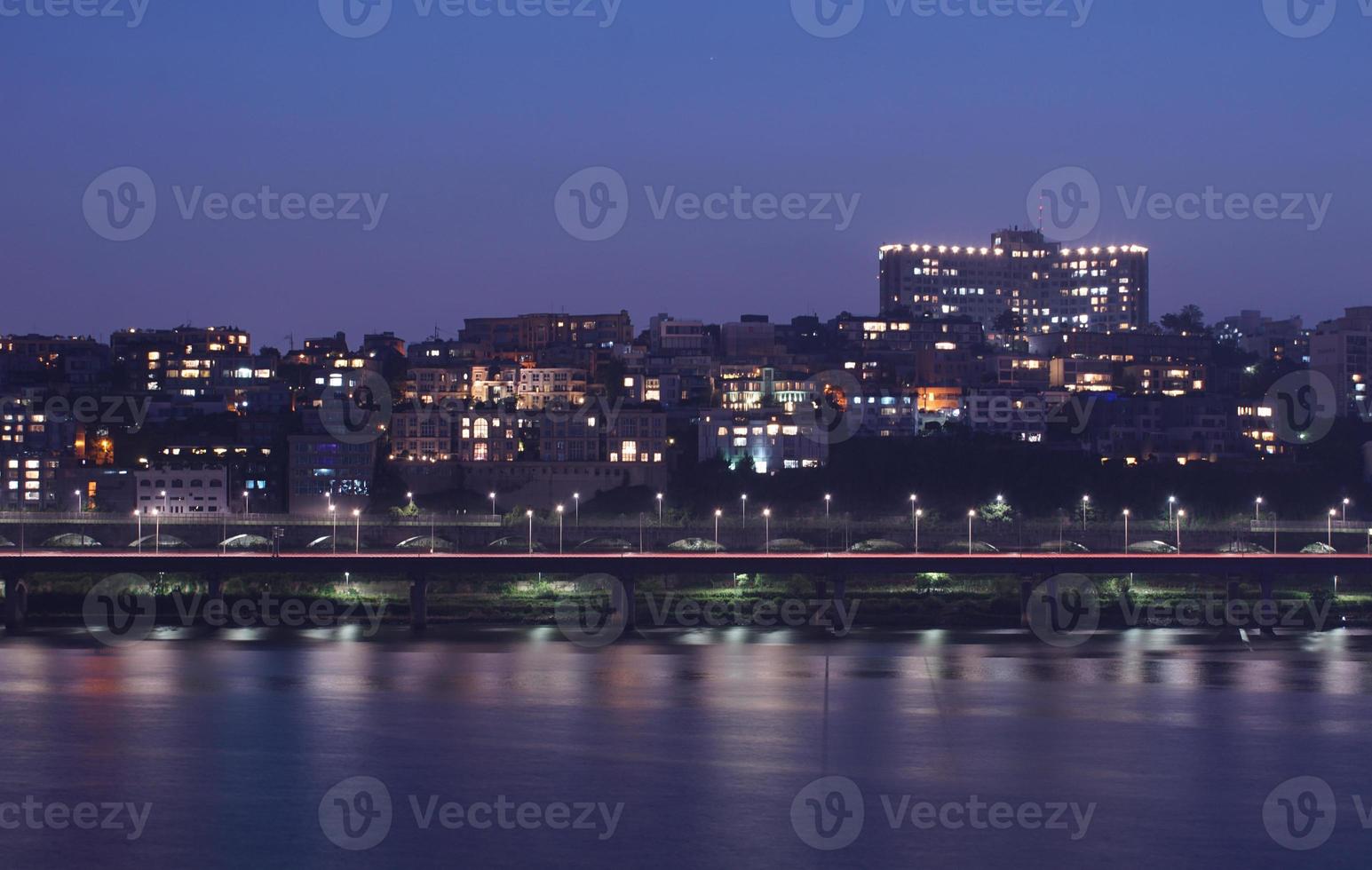 The night view of the big city from the sky is beautiful. photo
