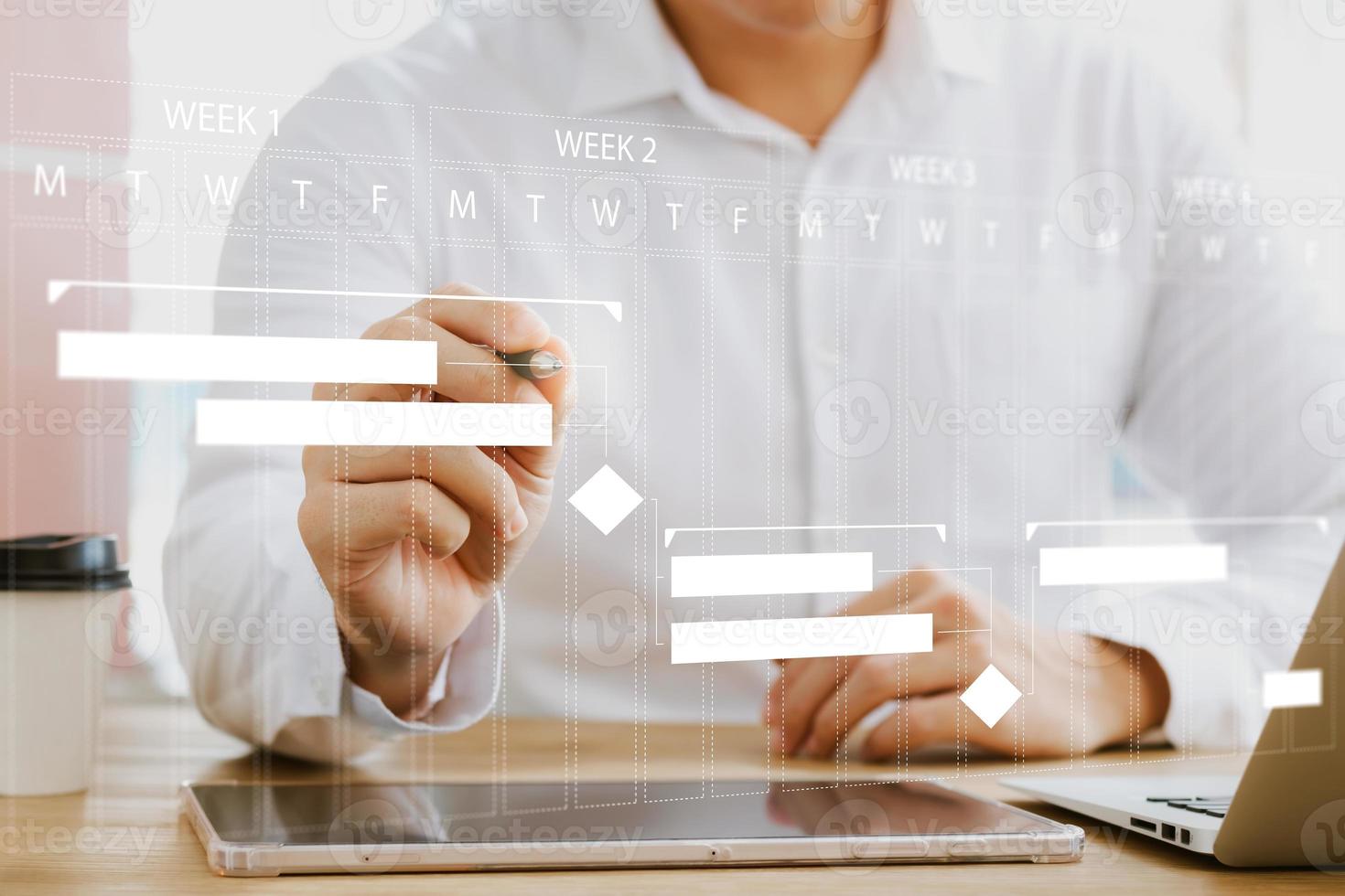 concept of time management and human resources Effectively, male businessman using a laptop computer Organizing work in a systematic way. photo