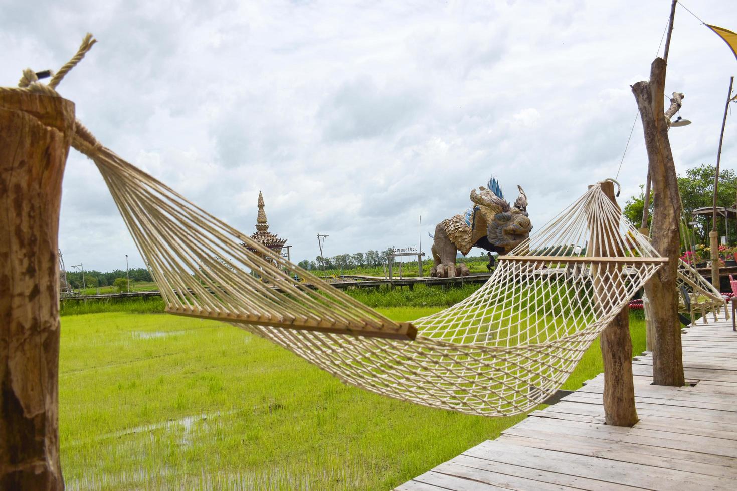 Photo corner for relaxing in a hammock in a resort in the middle of rice fields, a tourist attraction, Thai photography corner