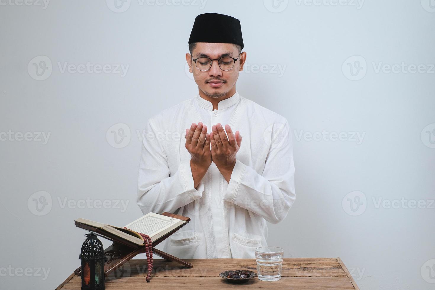 Ramadan kareem fasting month concept over white wall photo