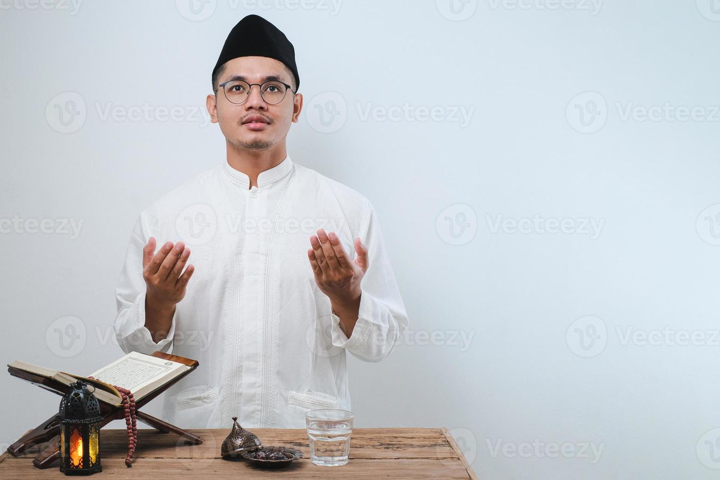 Ramadan kareem fasting month concept over white wall photo
