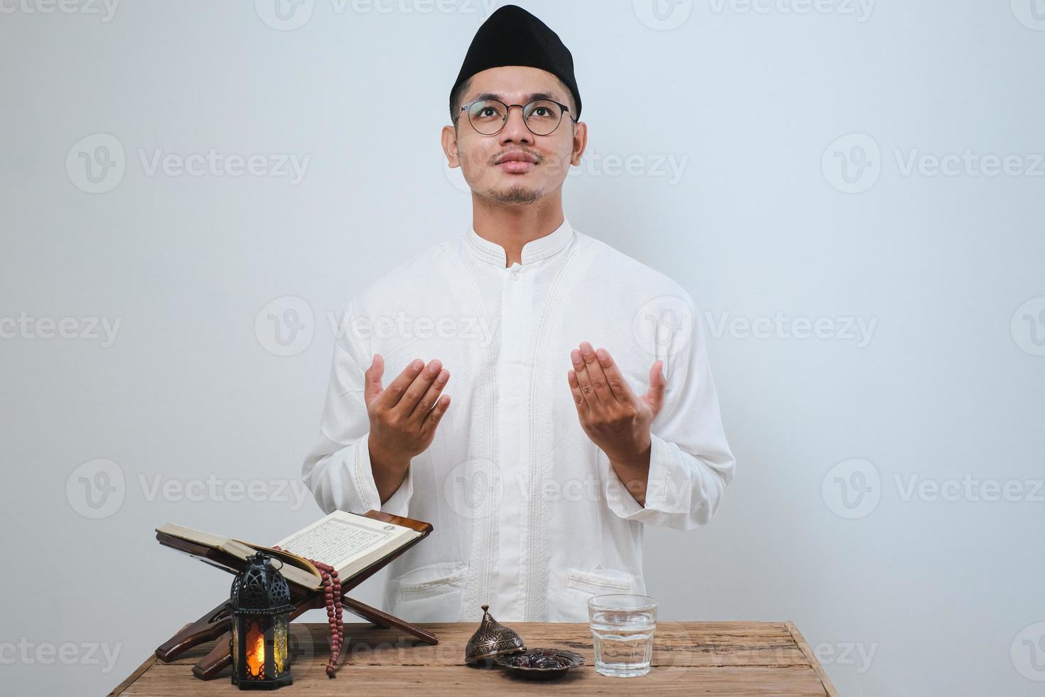 Ramadan kareem fasting month concept over white wall photo
