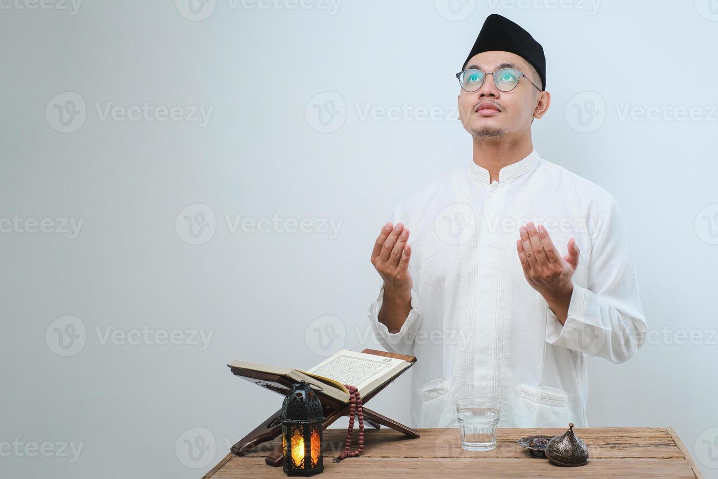 Ramadan kareem fasting month concept over white wall photo
