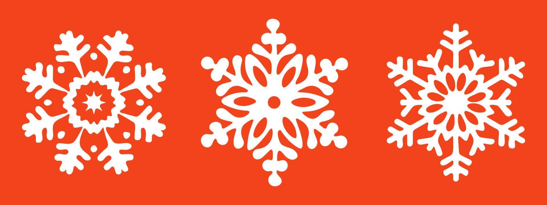 three snowflakes on a red background red vector