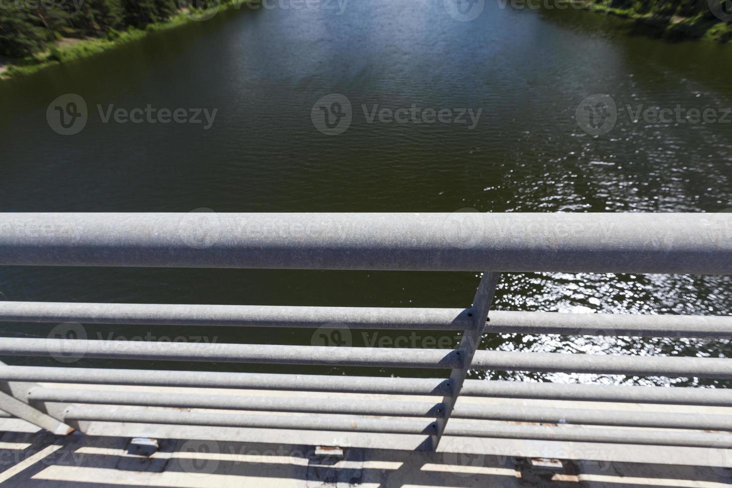 steel fences on the road to ensure the safety of cars photo