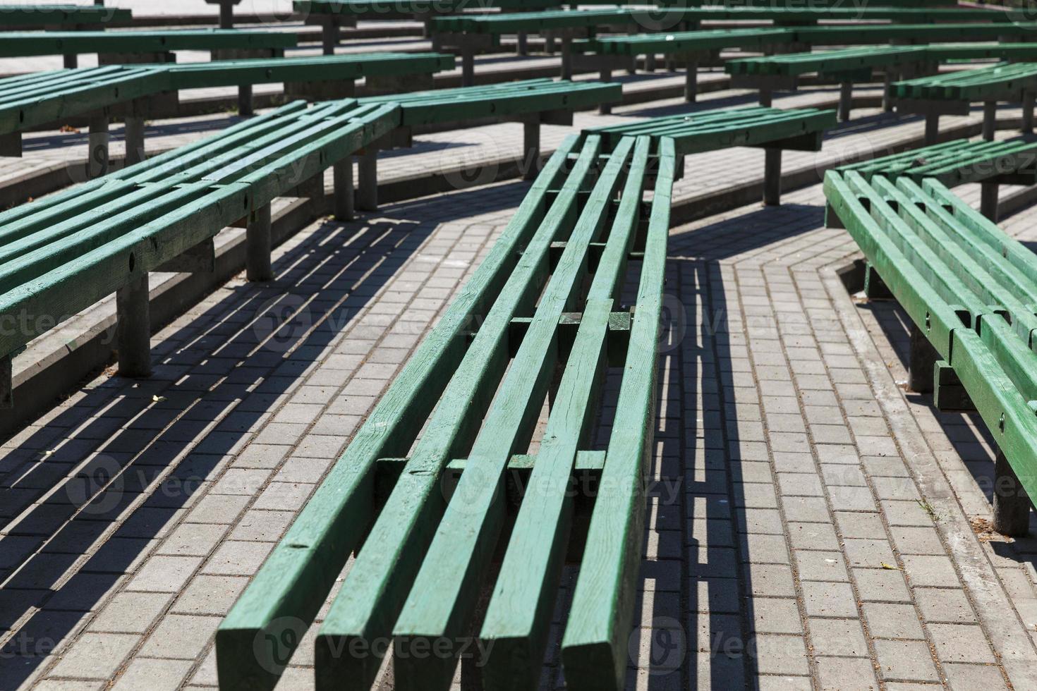 old wooden benches of green color photo