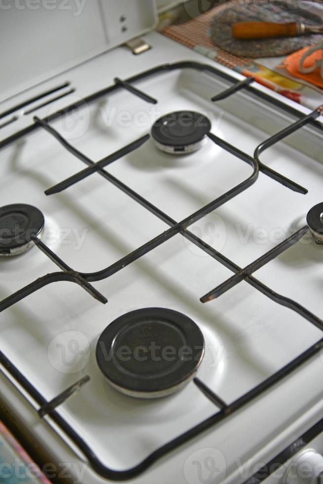 White kitchen gas stove during the day photo