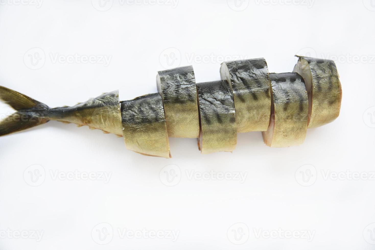 Cold smoked mackerel cut into slices on a white background. photo