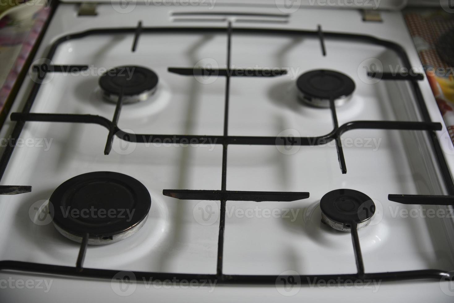 White kitchen gas stove during the day photo