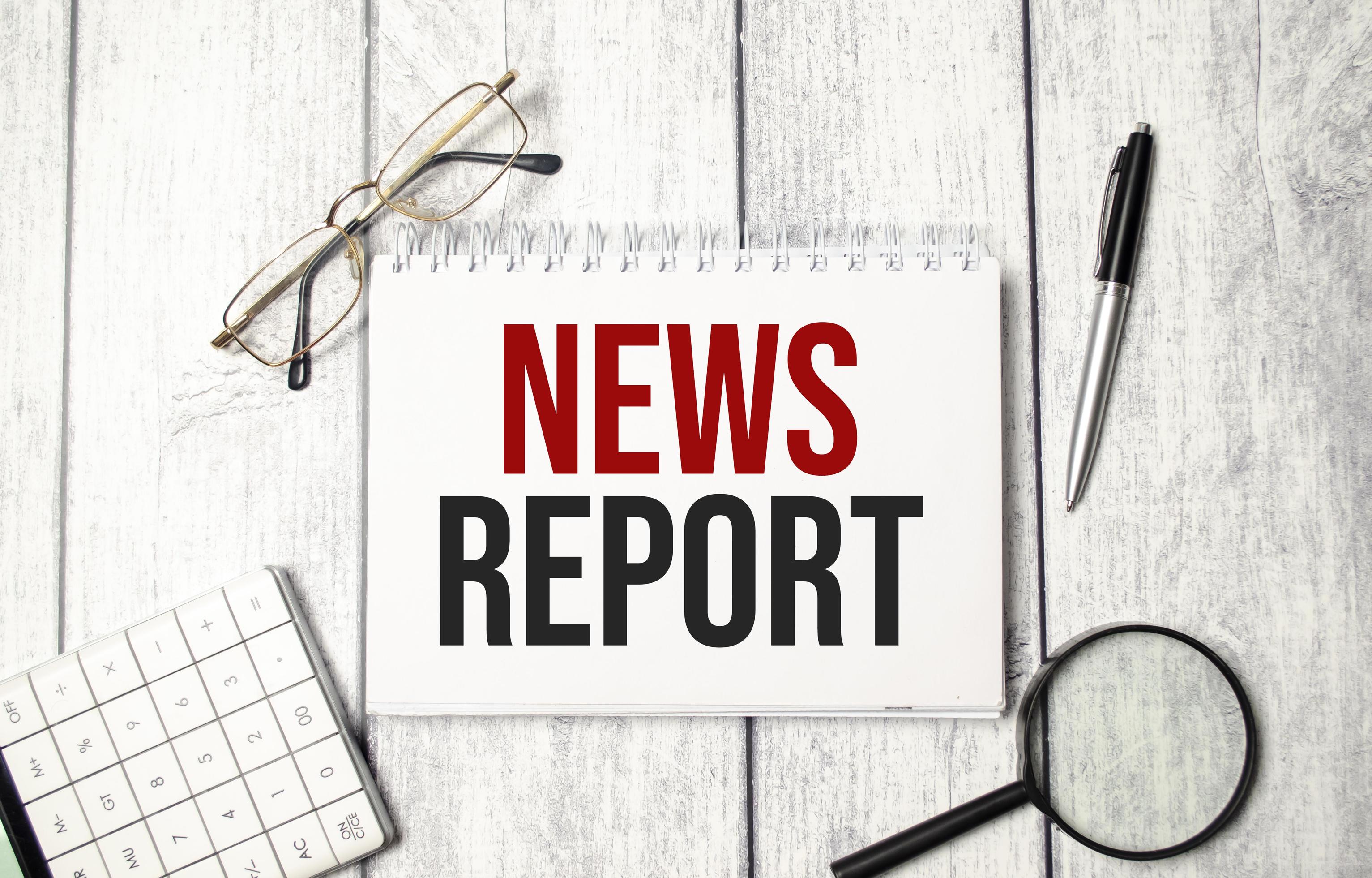 News Report words on notepad and pen, calculator and glasses 9690153 News Report words on notepad and pen, calculator and glasses 9690153