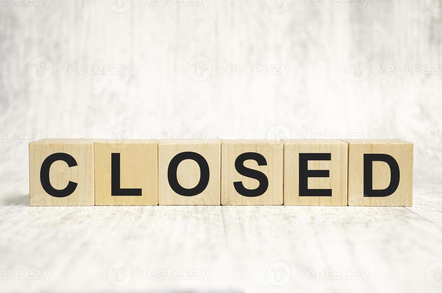 closed word abstract in wooden blocks. concept photo