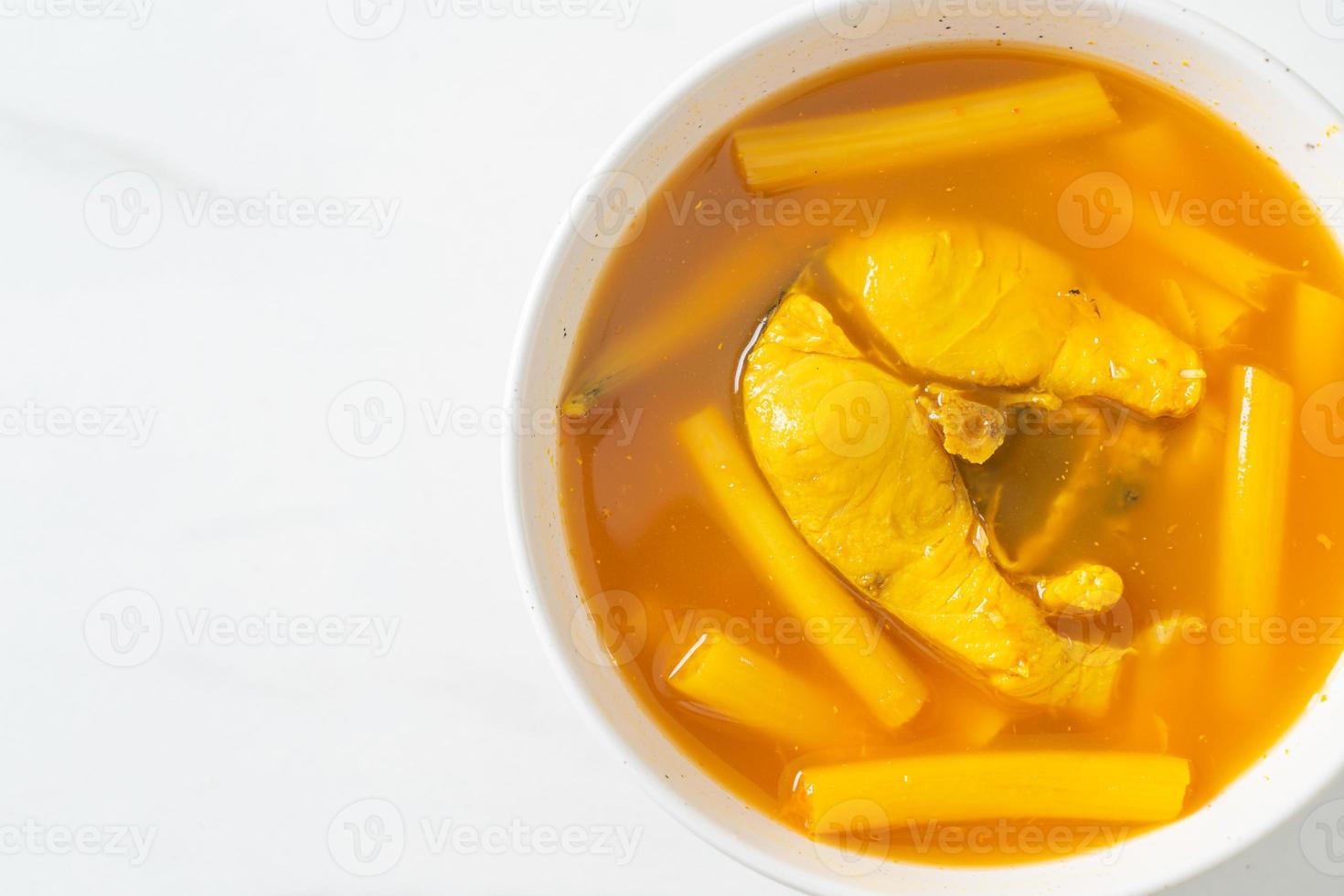 Sour soup with lotus stem and fish photo