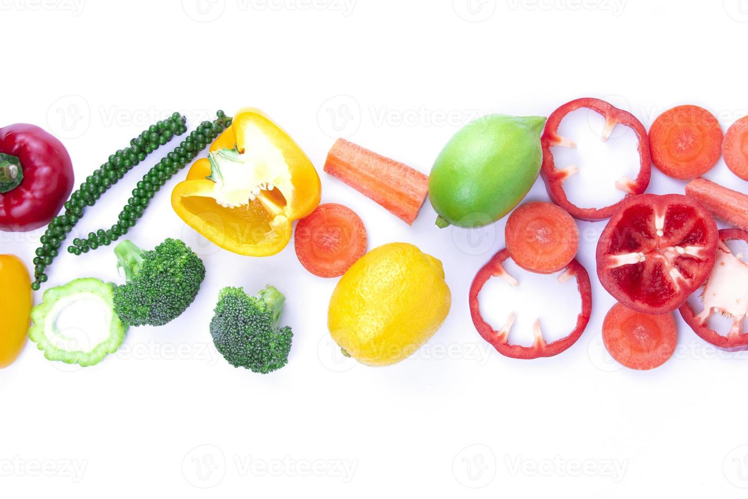 Healthy fruits Mixed isolated on white background with pace for text description,  Healthy Food placed on center backgroud of different fruits and vegetables photo