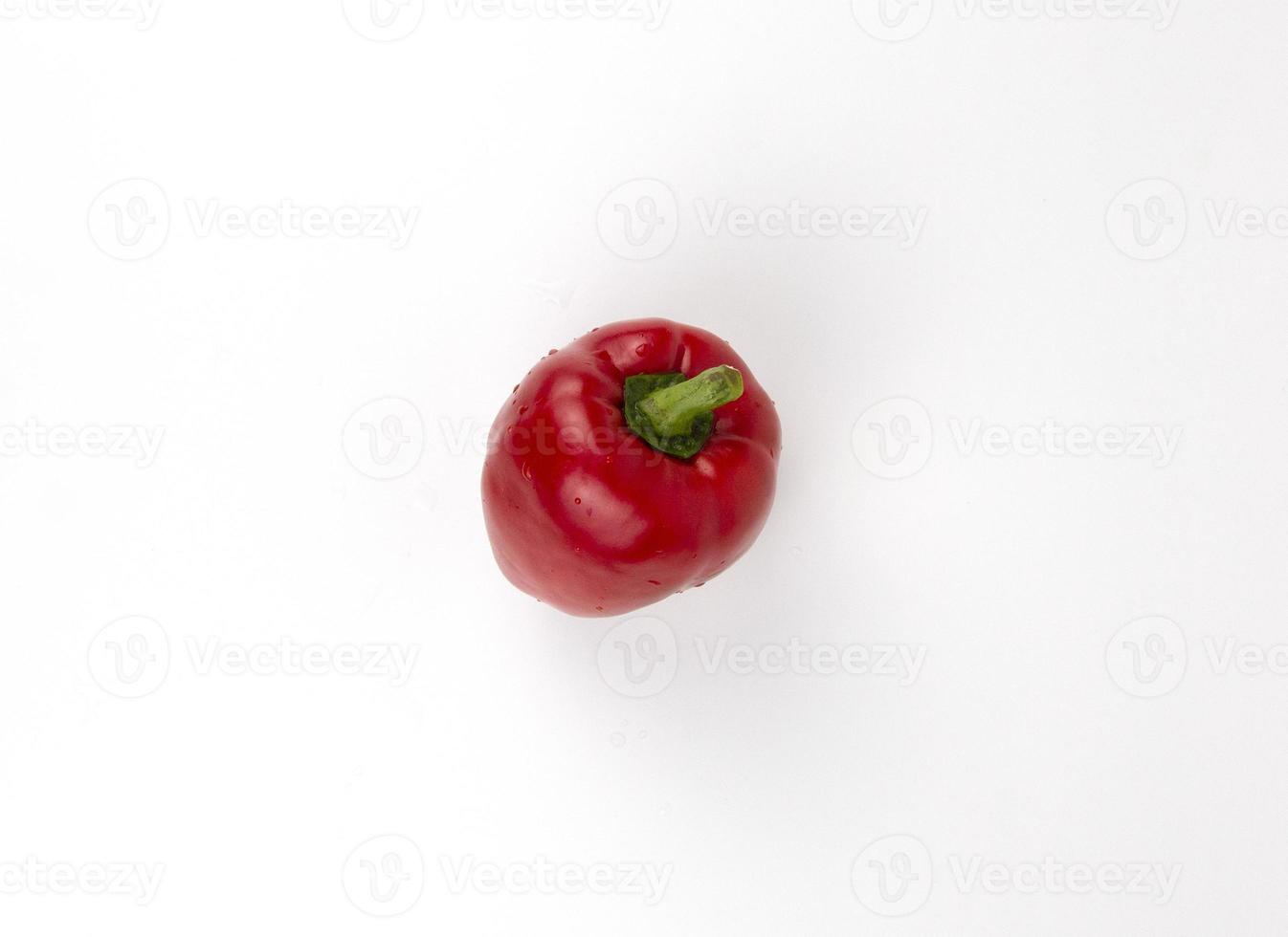 Red bell pepper isolated on white background photo