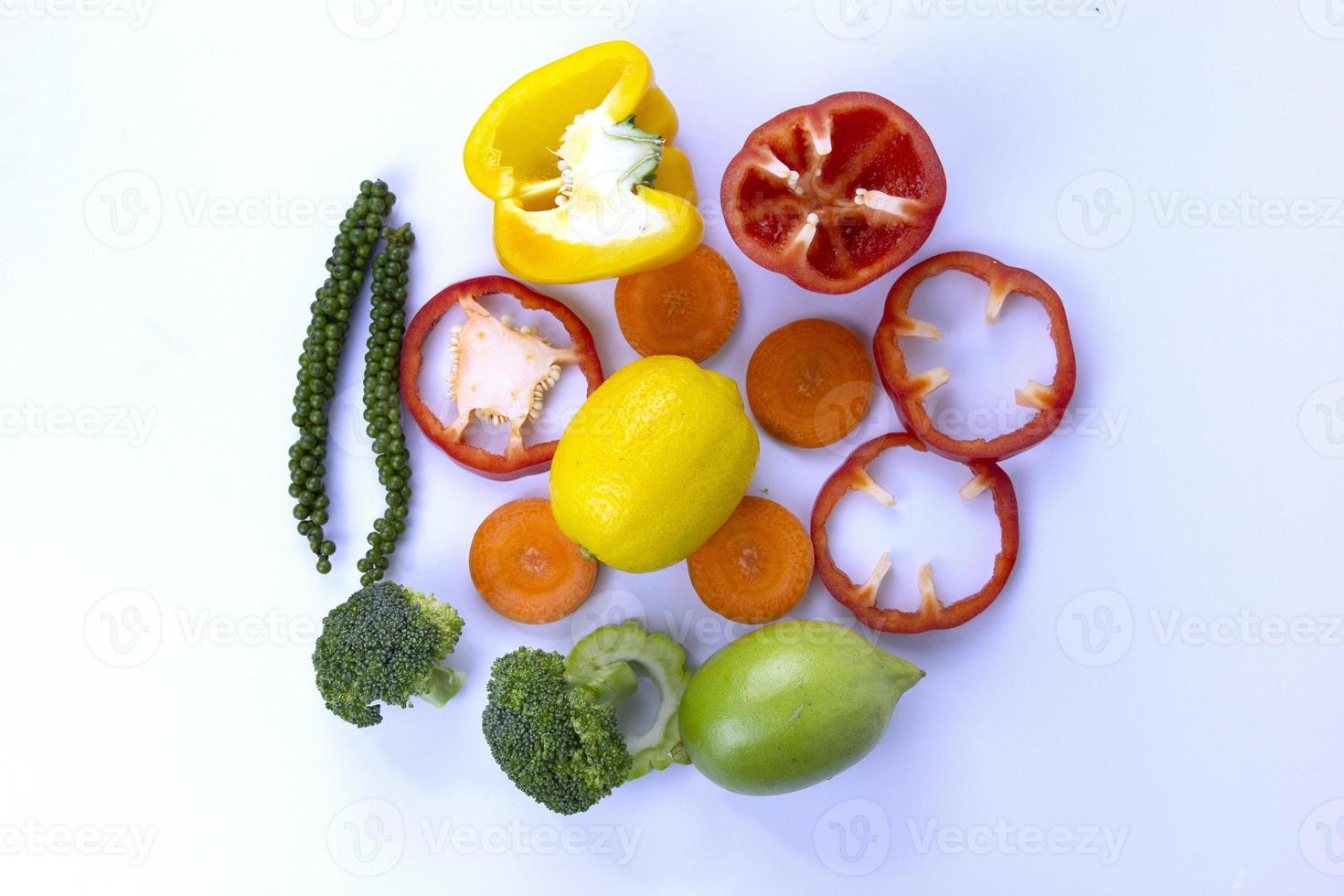 Healthy fruits Mixed isolated on white background with pace for text,  Healthy Food placed on center backgroud from different fruits and vegetables for Shopping concepts photo