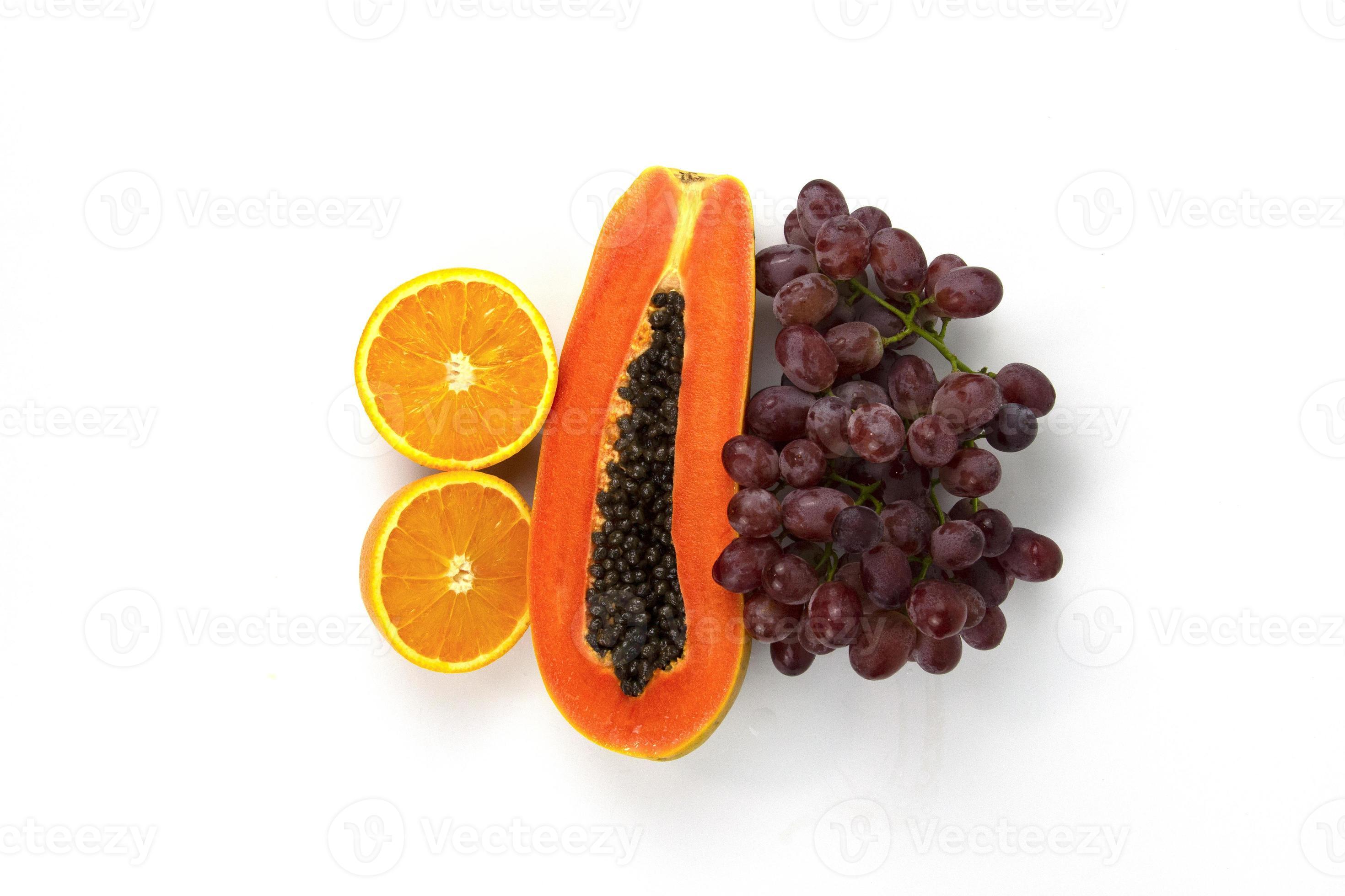 TWO pieces of sweet orange and one piece of Papaya isolated on white  background 9695160 Stock Photo at Vecteezy