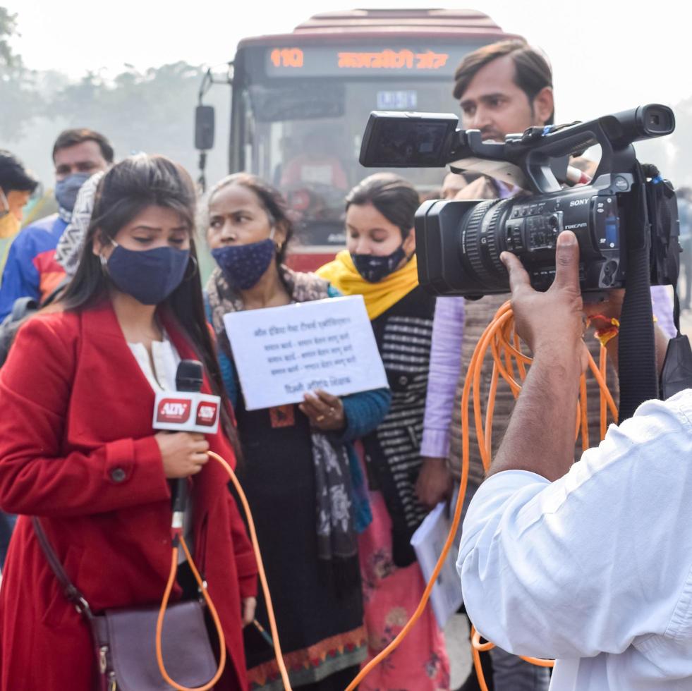 New Delhi, India December 25 2021 - Delhi Contractual Guest Teachers with posters, flags and graffitis protesting against Delhi AAP Government for making policy, Delhi Guest Teachers protesting photo