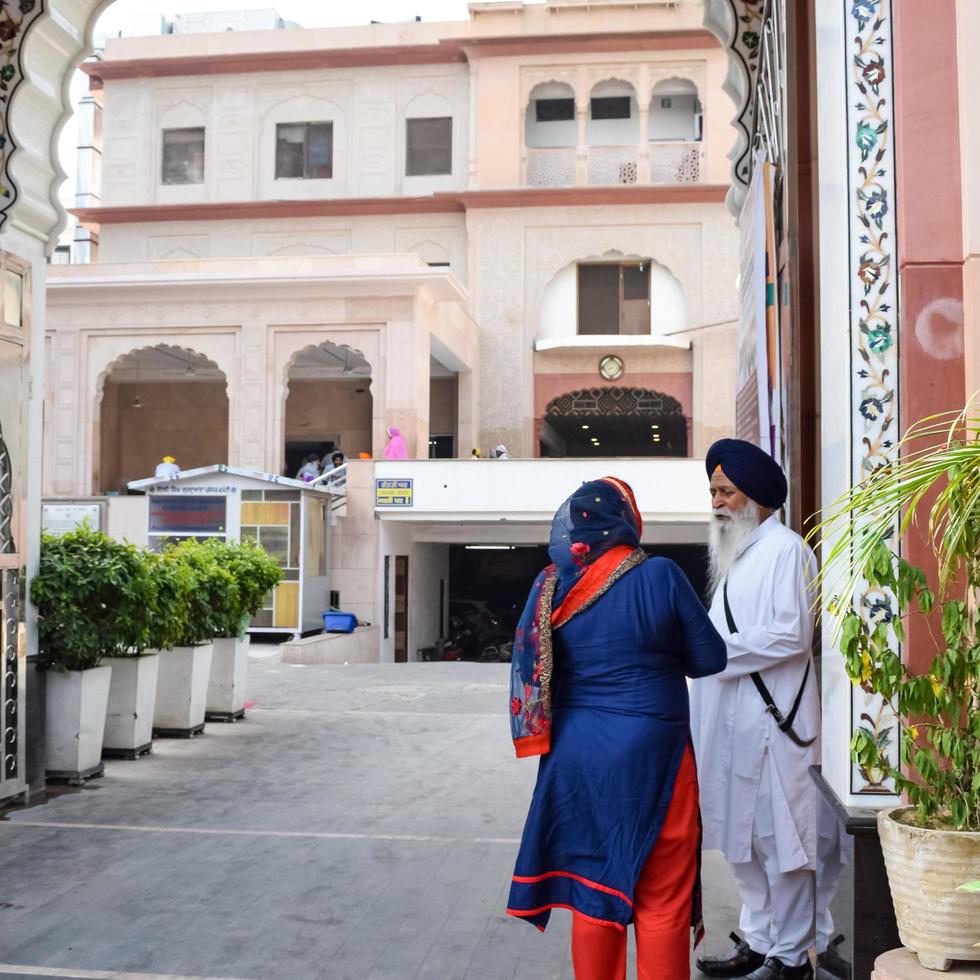 Old Delhi, India, April 15, 2022 - Gurudwara Sis Ganj Sahib is one of the nine historical Gurdwaras in Old Delhi in India, Sheesh Ganj Gurudwara in Chandni Chowk, opposite Red Fort in Old Delhi India photo