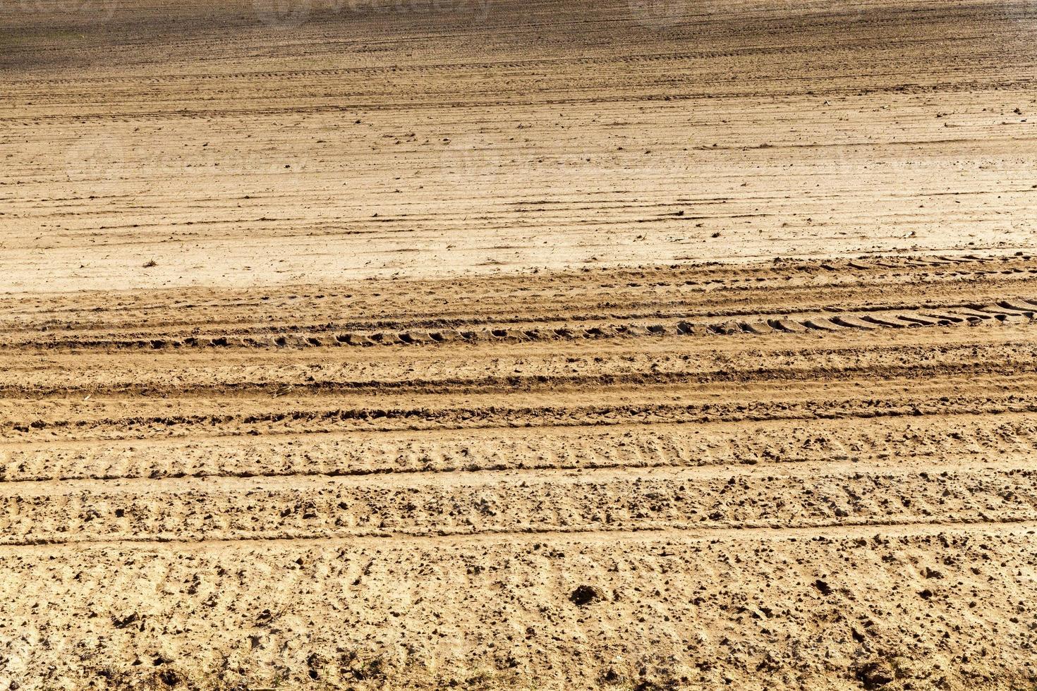 plowed soil close up photo