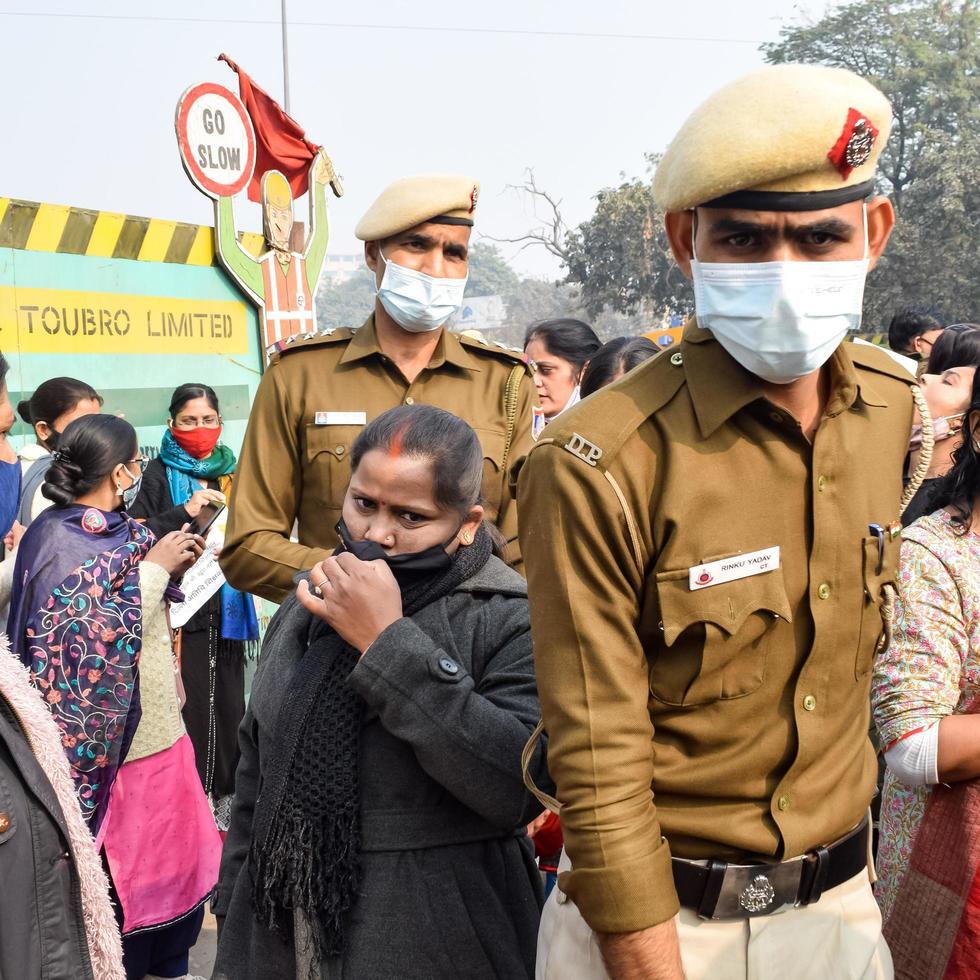 New Delhi, India December 25 2021 - Delhi Contractual Guest Teachers with posters, flags and graffitis protesting against Delhi AAP Government for making policy, Delhi Guest Teachers protesting photo