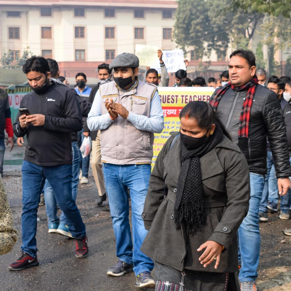New Delhi, India December 25 2021 - Delhi Contractual Guest Teachers with posters, flags and graffitis protesting against Delhi AAP Government for making policy, Delhi Guest Teachers protesting photo