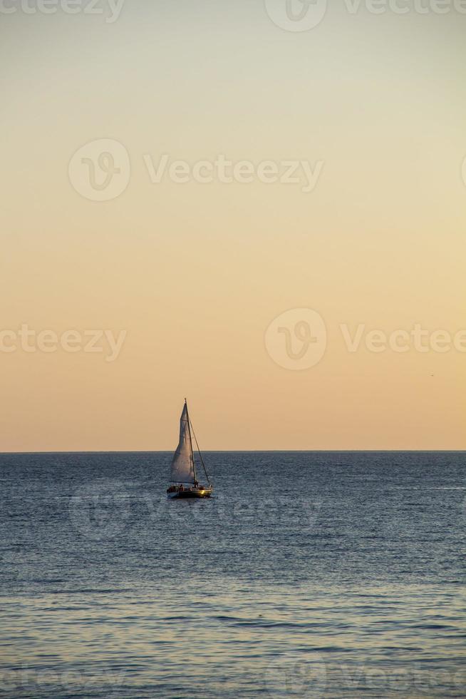 Sailing Yacht In The Sea At Sunset. Black Sea. photo