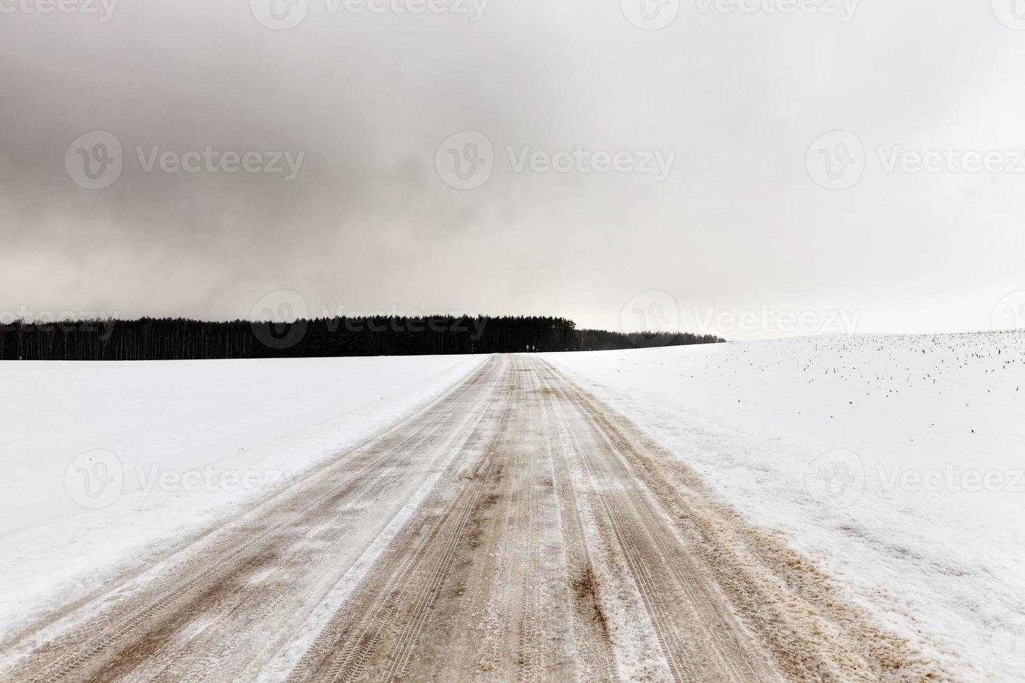 narrow winter road photo