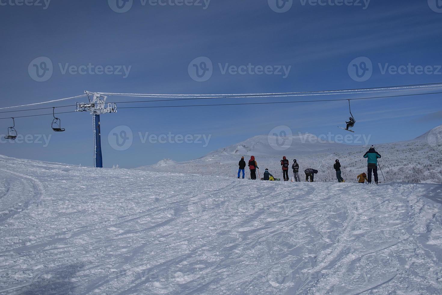 sunny winter morning in the mountains of sheregesh on the ski track photo