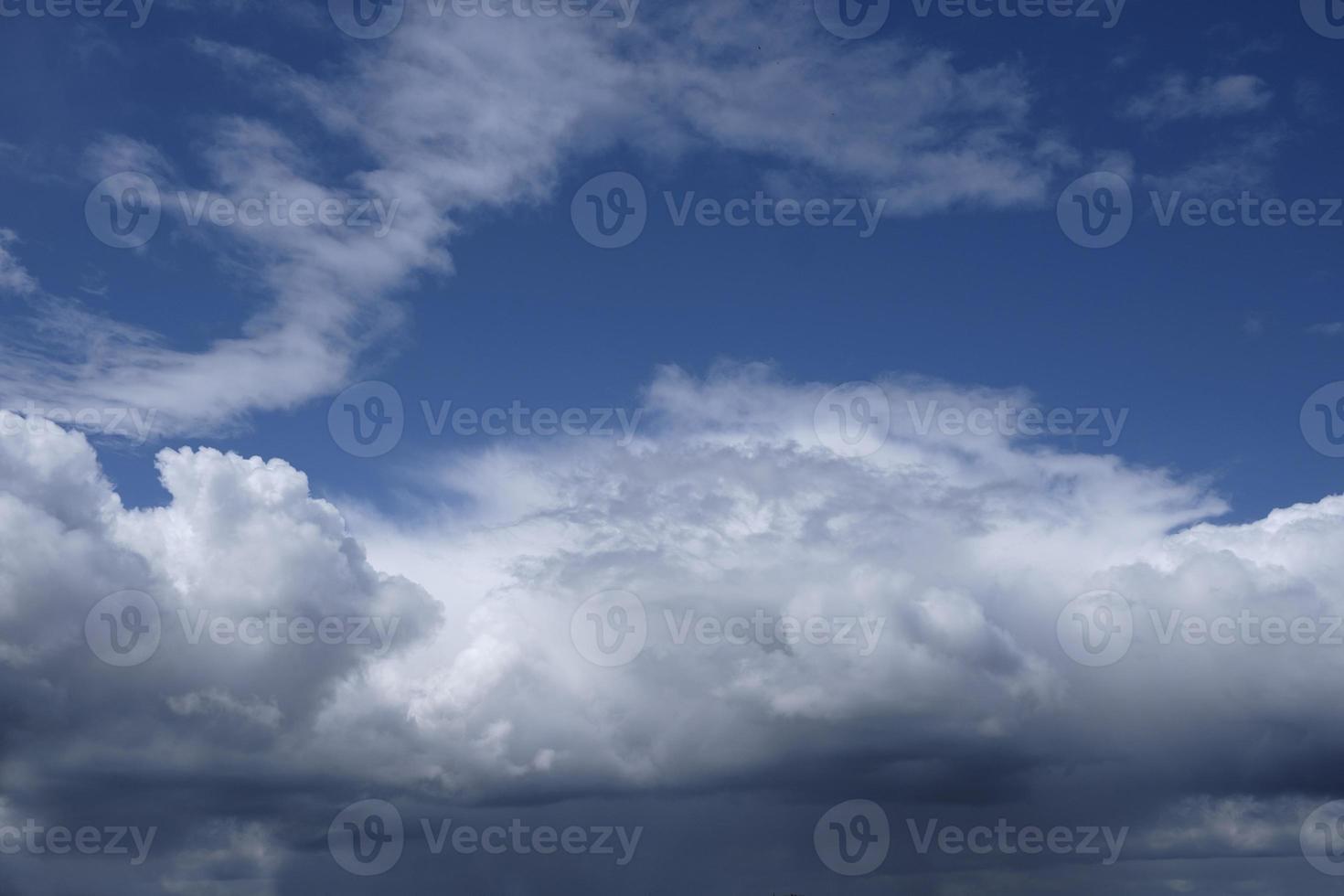 boundless expanse of the sky with cumulus clouds and rays of the sun, moments of daybreak and sunset photo